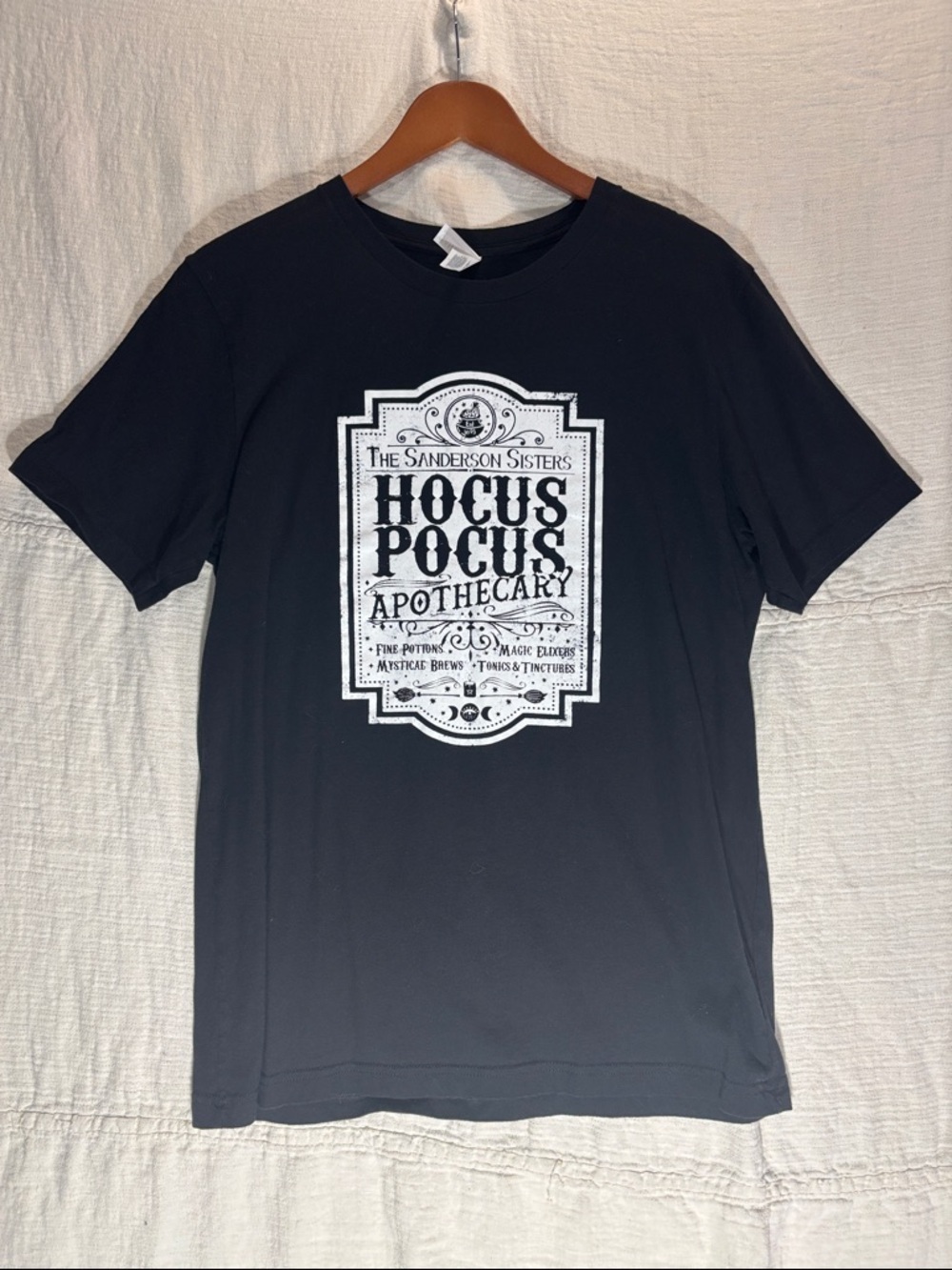 Bella Canvas Black Tee with White Hocus Pocus Apothecary Graphic